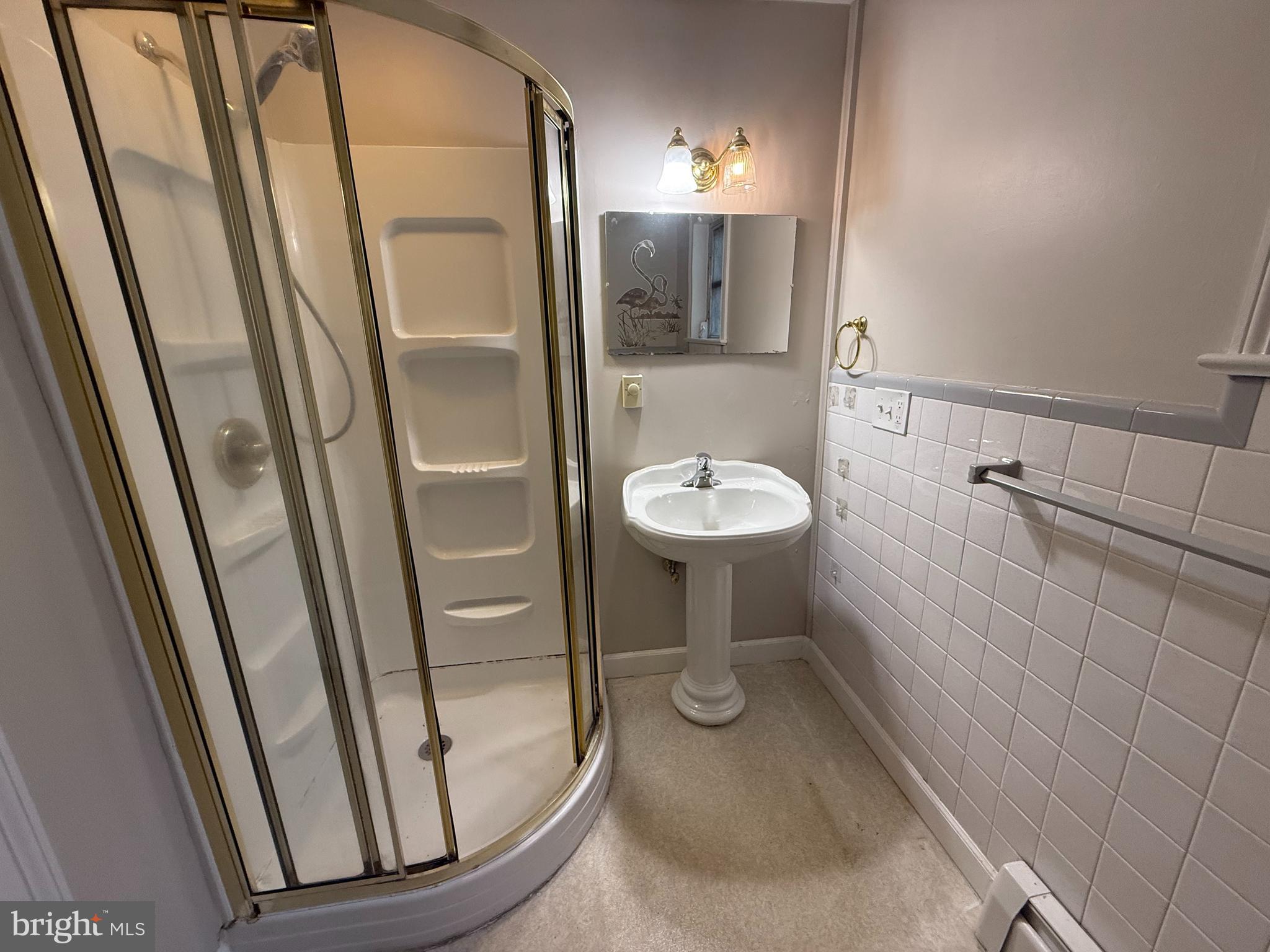 17 Wayne Road Bridgeton, NJ 08302 - Photo 31 of 49 a bathroom with a sink a toilet and a mirror