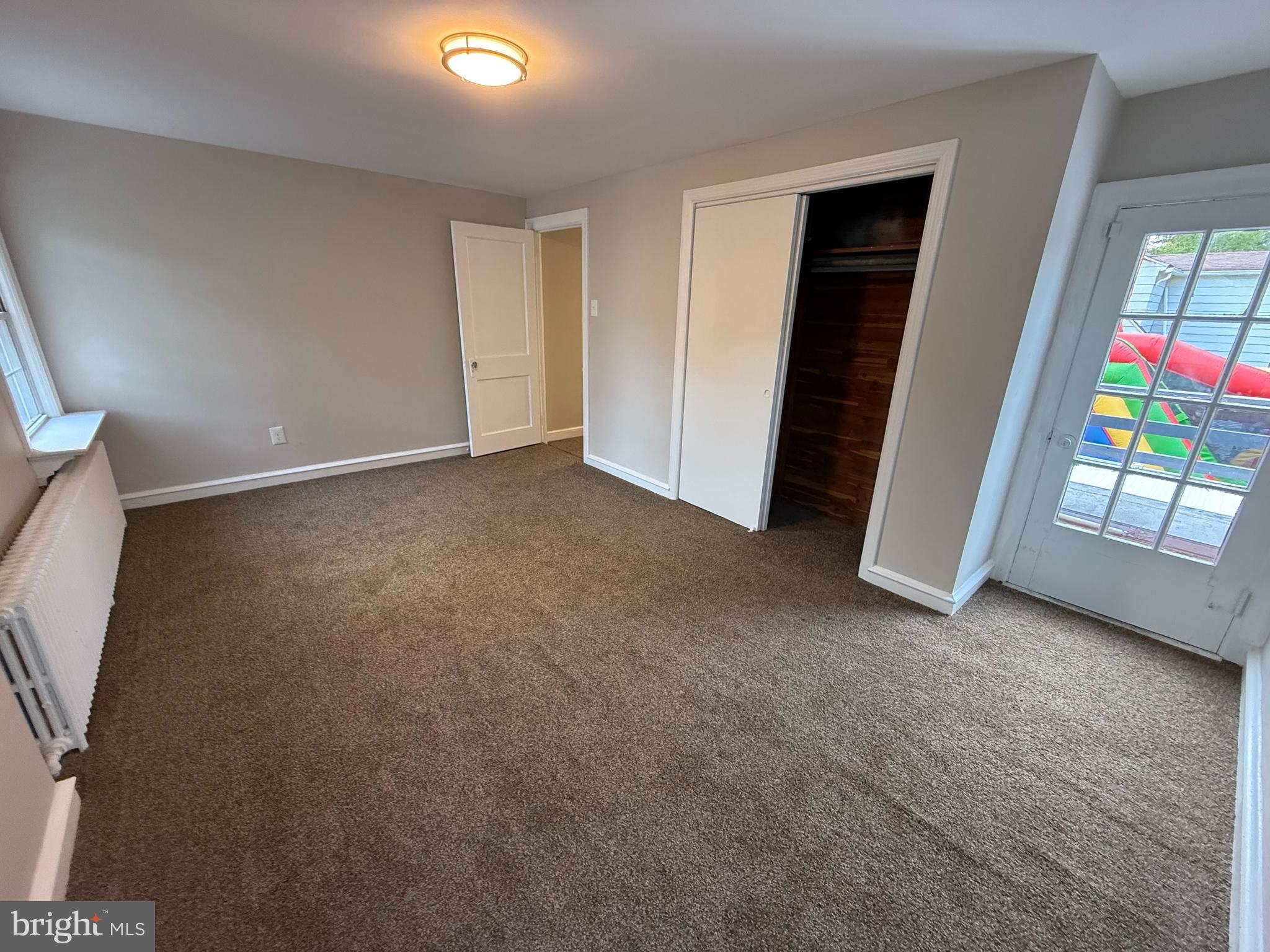 17 Wayne Road Bridgeton, NJ 08302 - Photo 40 of 49 a view of an empty room and a window