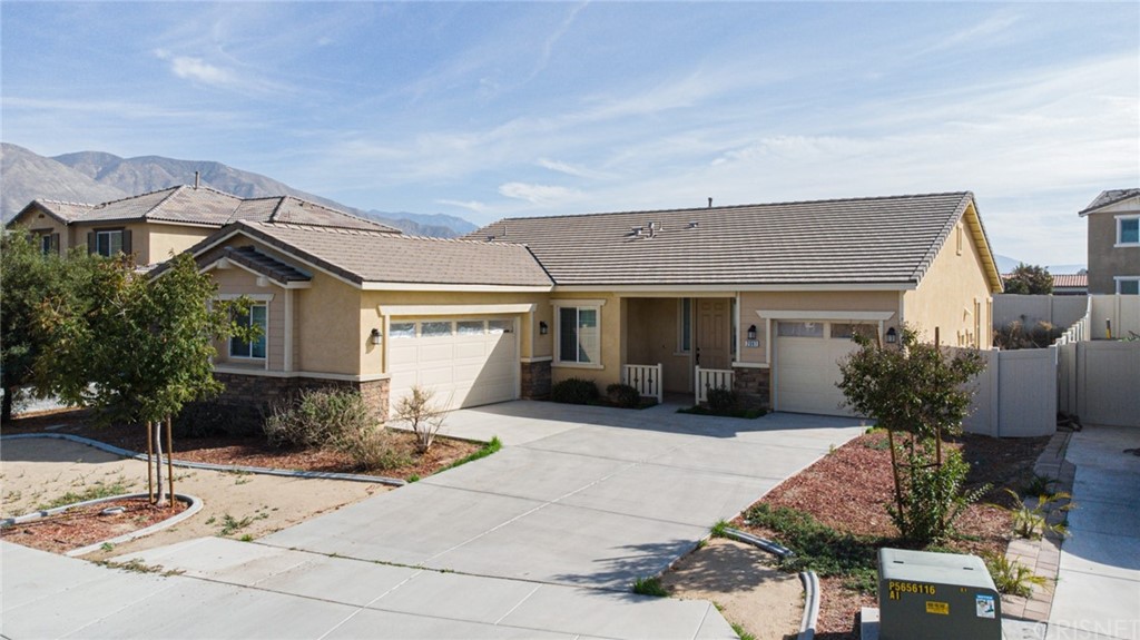 a view of a house with outdoor space and porch