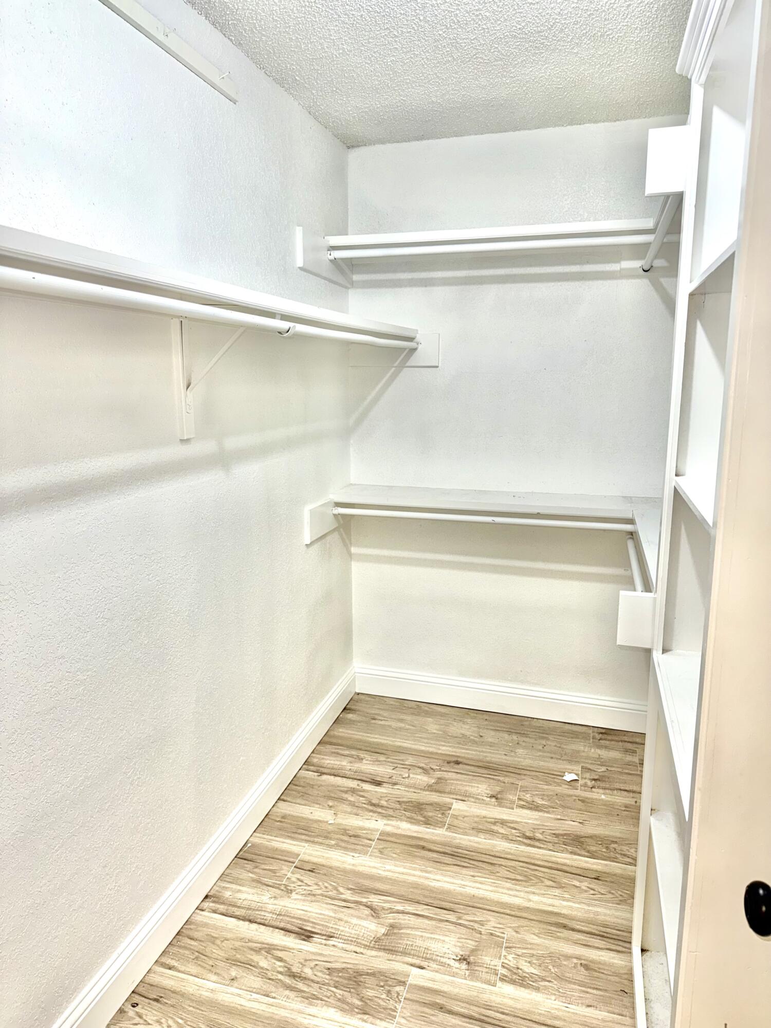 5415 73rd Street Lubbock, TX 79424 - Photo 7 of 13 a view of a room with an empty refrigerator