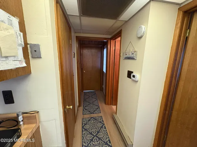 a bathroom with a granite countertop toilet sink and shower