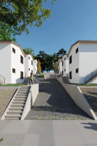 a car parked in front of a white house