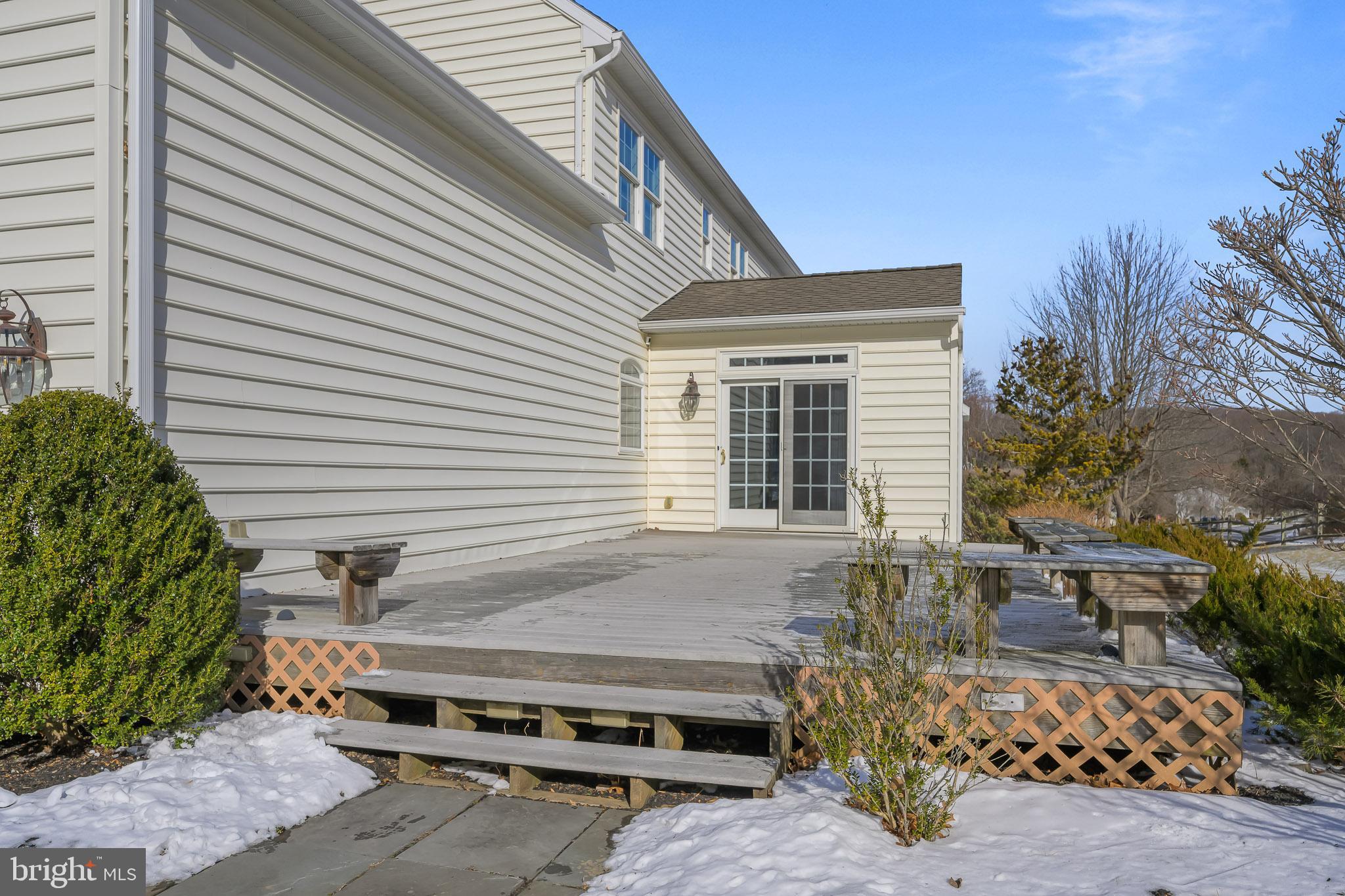 305 Williamson Way Downingtown, PA 19335 - Photo 11 of 60 a backyard of a house with outdoor seating and trees