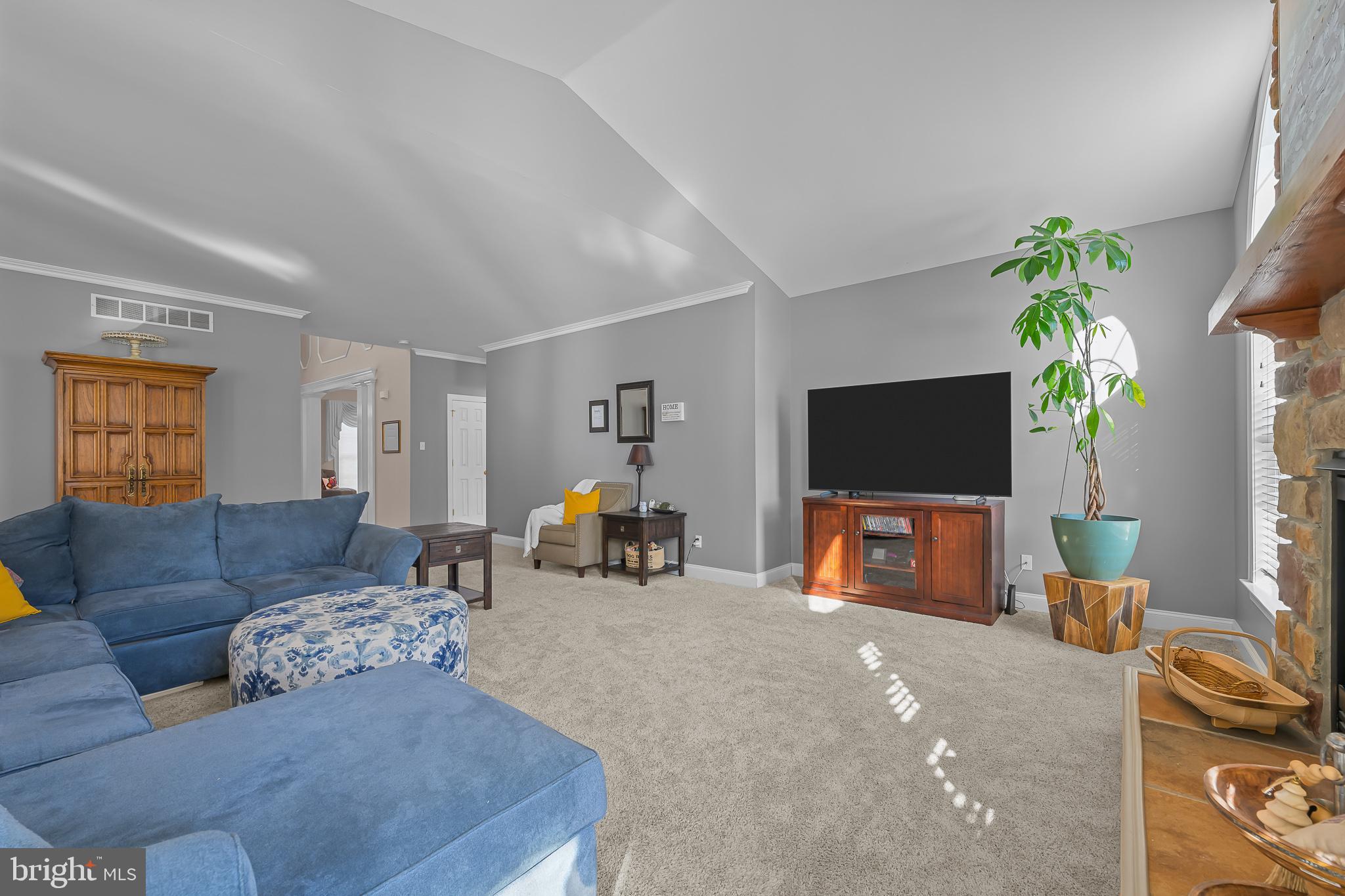 305 Williamson Way Downingtown, PA 19335 - Photo 16 of 60 a living room with furniture and a flat screen tv