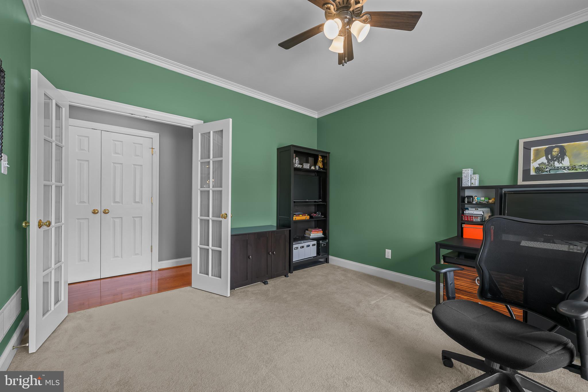 305 Williamson Way Downingtown, PA 19335 - Photo 17 of 60 a room with furniture and a ceiling fan