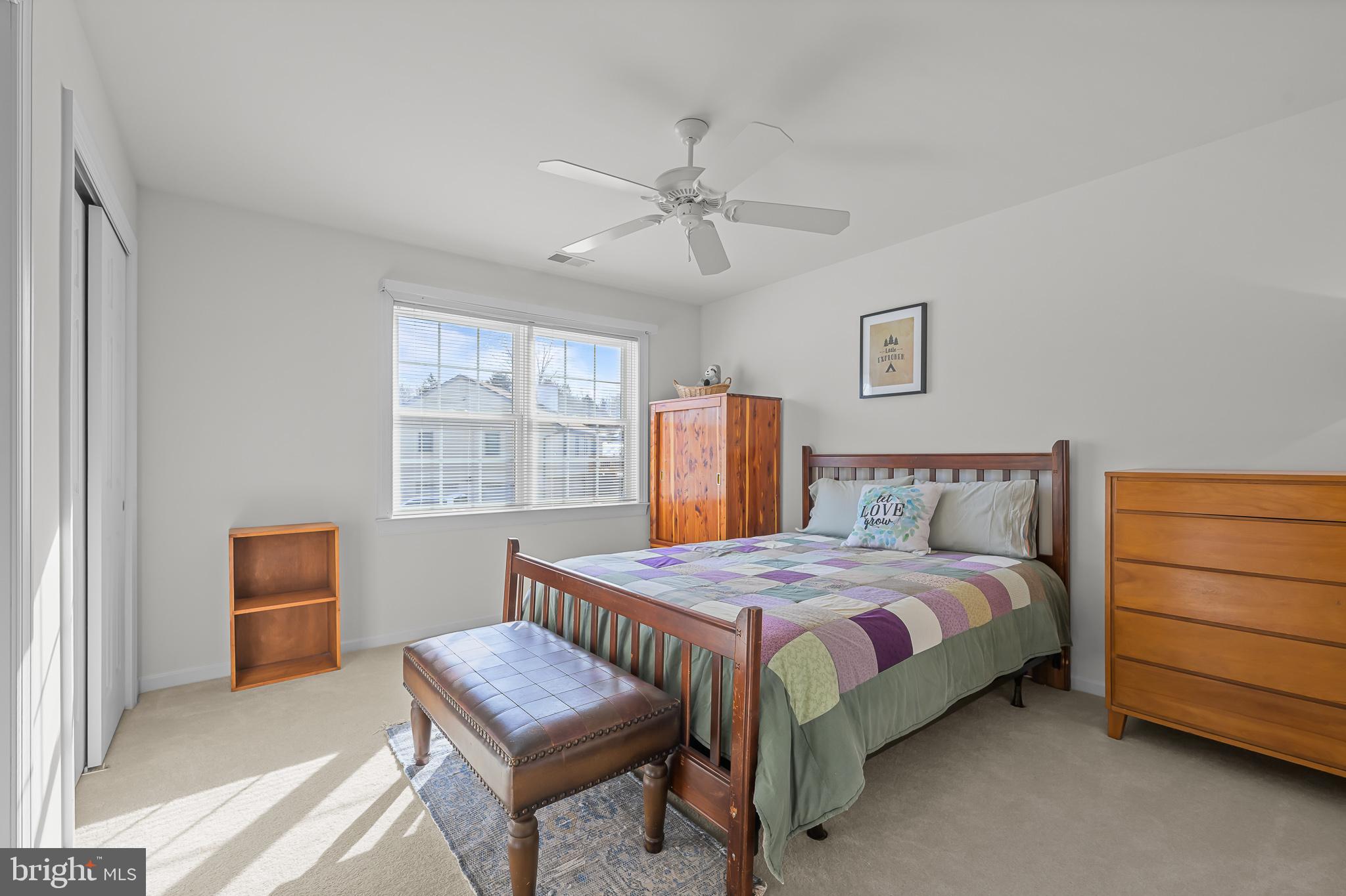 305 Williamson Way Downingtown, PA 19335 - Photo 28 of 60 a bedroom with a bed dresser and a window