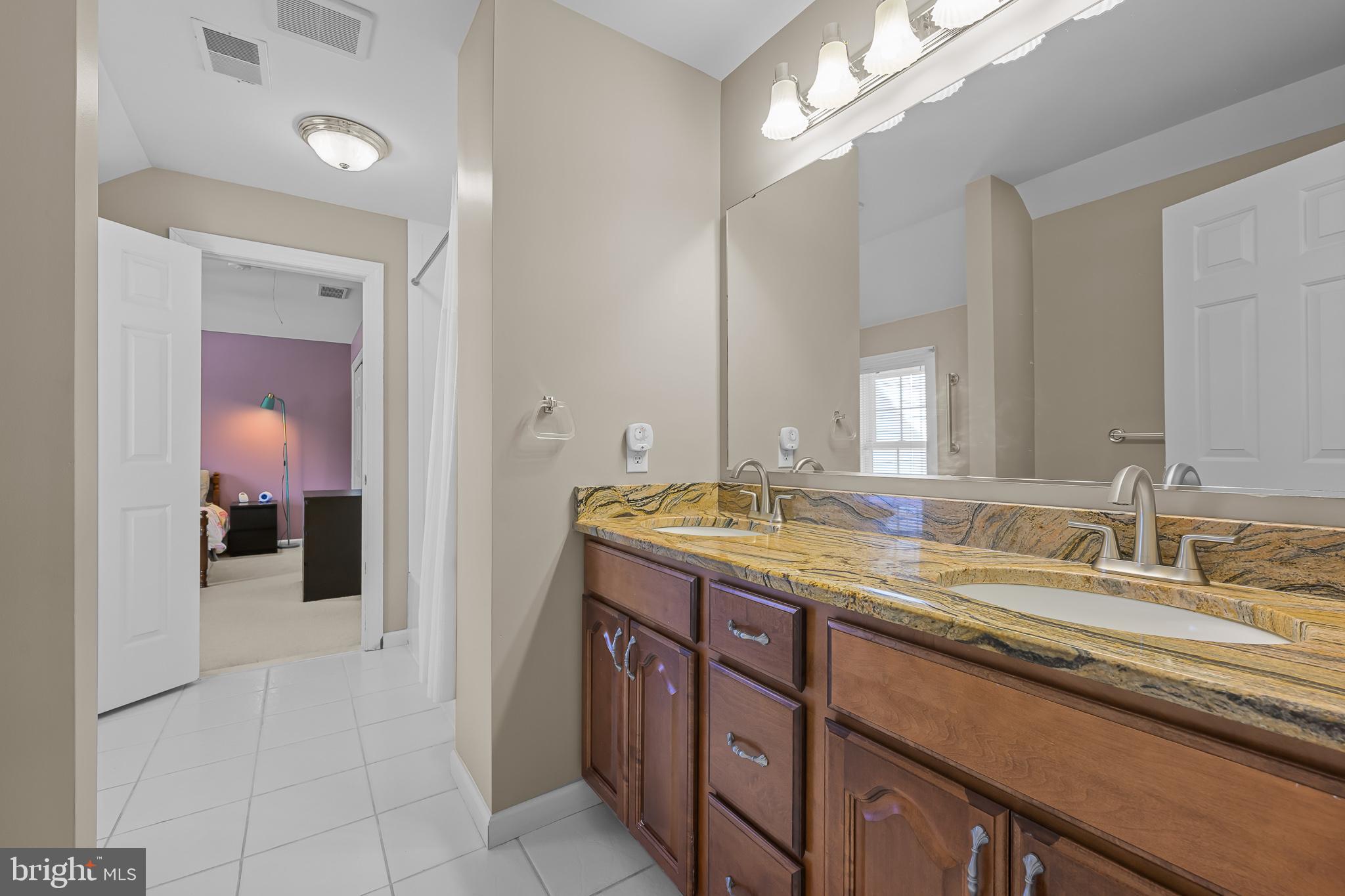 305 Williamson Way Downingtown, PA 19335 - Photo 33 of 60 a en suite bathroom with a granite countertop sink and a mirror
