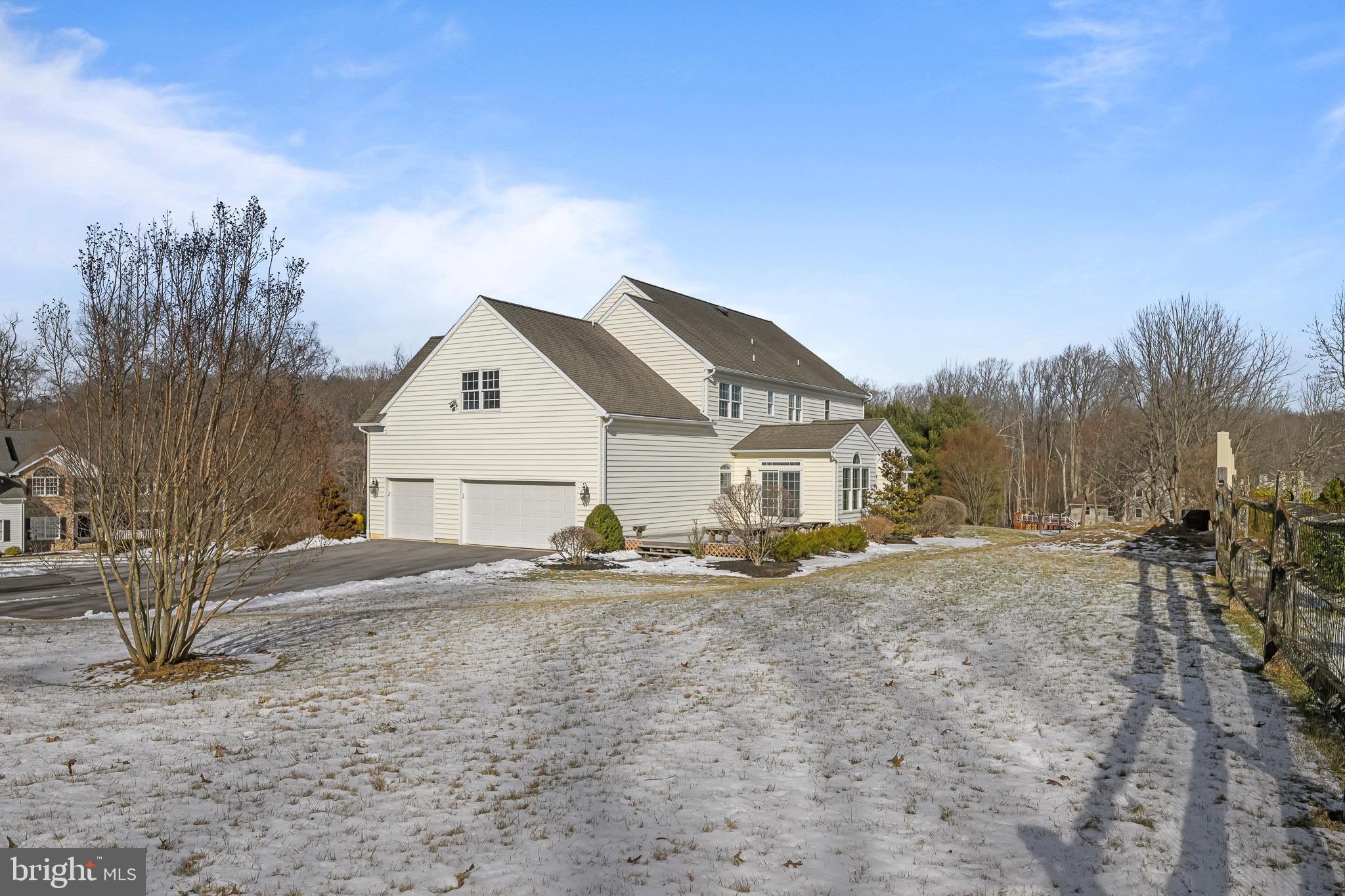 305 Williamson Way Downingtown, PA 19335 - Photo 42 of 60 a view of a house with a snow in the background