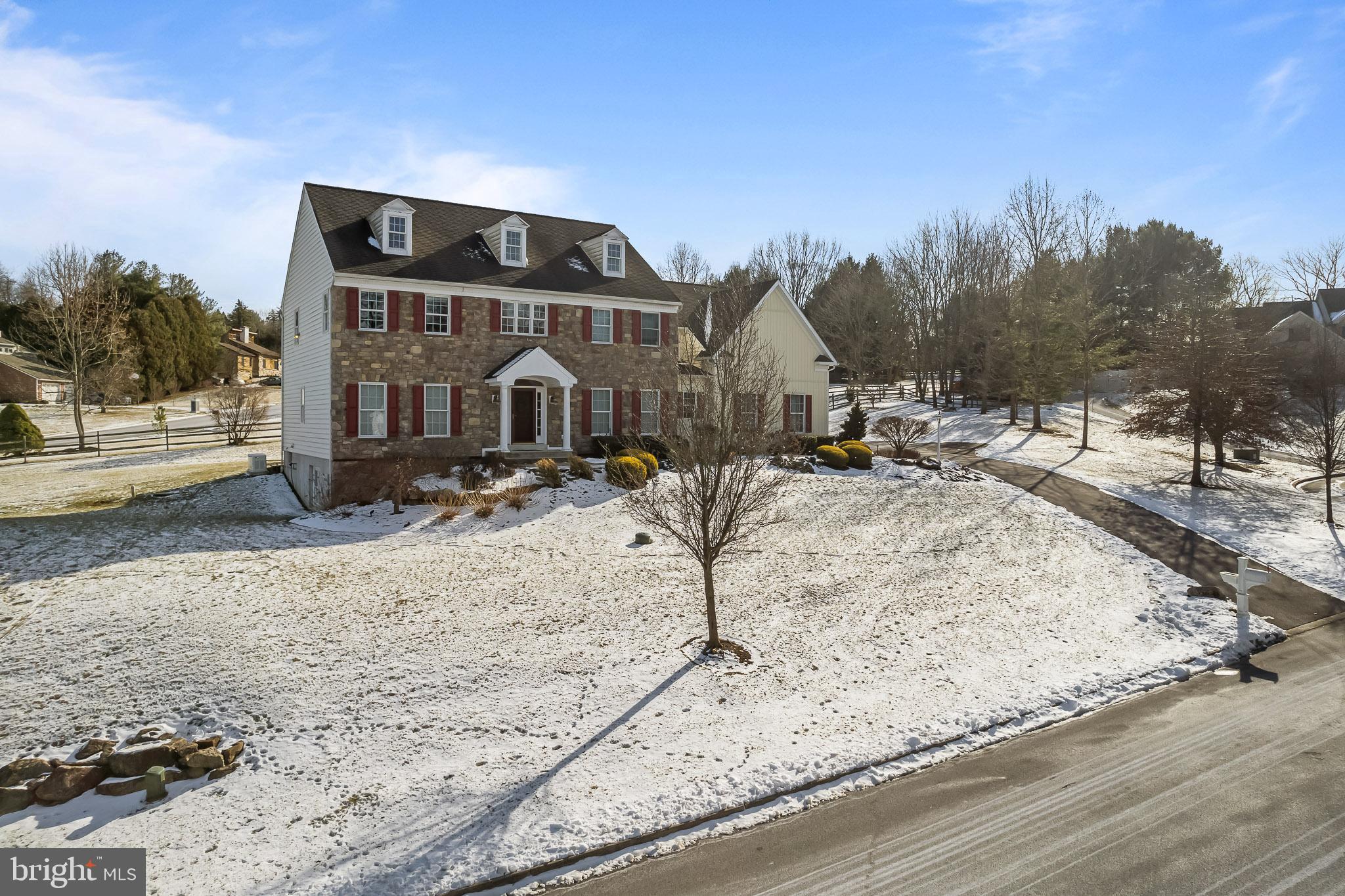 305 Williamson Way Downingtown, PA 19335 - Photo 55 of 60 a view of a houses with snow on the road