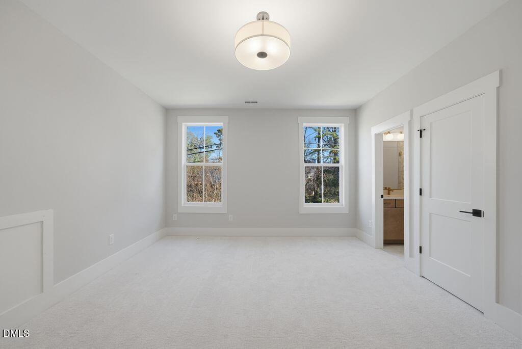 1500 Shadowood Lane Raleigh, NC 27612 - Photo 28 of 39 a view of an empty room with a window