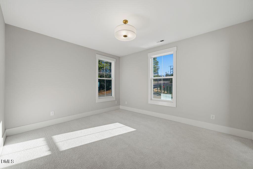 1500 Shadowood Lane Raleigh, NC 27612 - Photo 30 of 39 a view of empty room with window