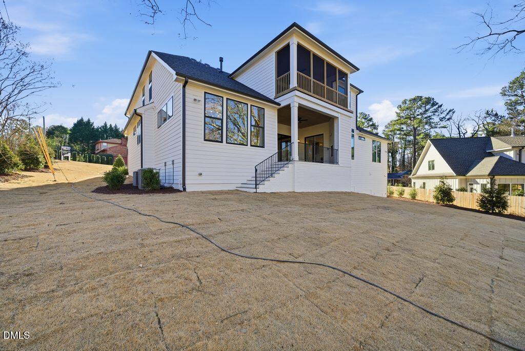 1500 Shadowood Lane Raleigh, NC 27612 - Photo 35 of 39 a front view of a house with a yard
