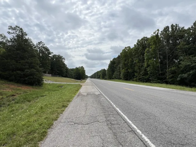 a view of a backyard of the house