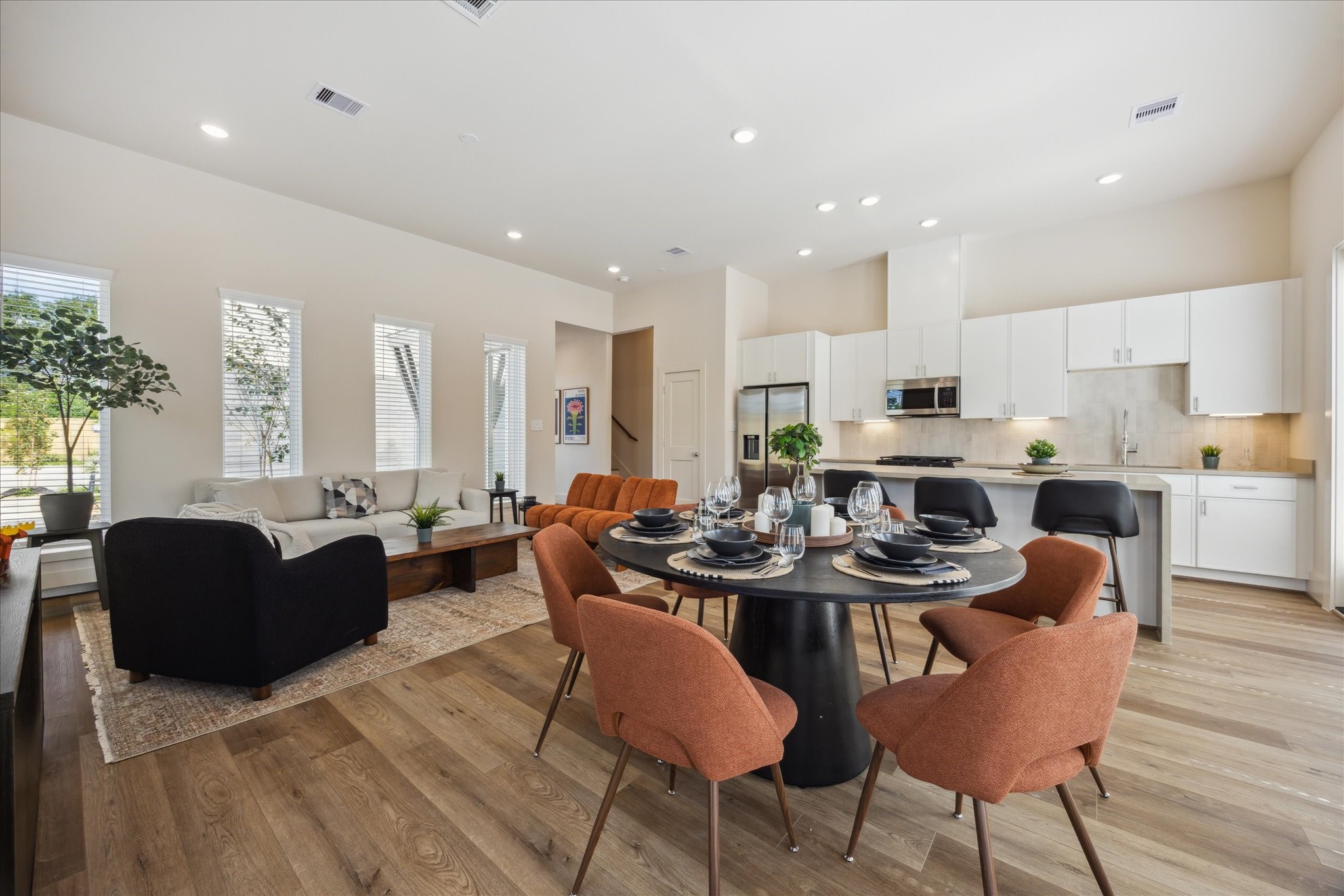 5903 Urban Pines Street Houston, TX 77091 - Photo 4 of 42 a view of a dining room with furniture and wooden floor