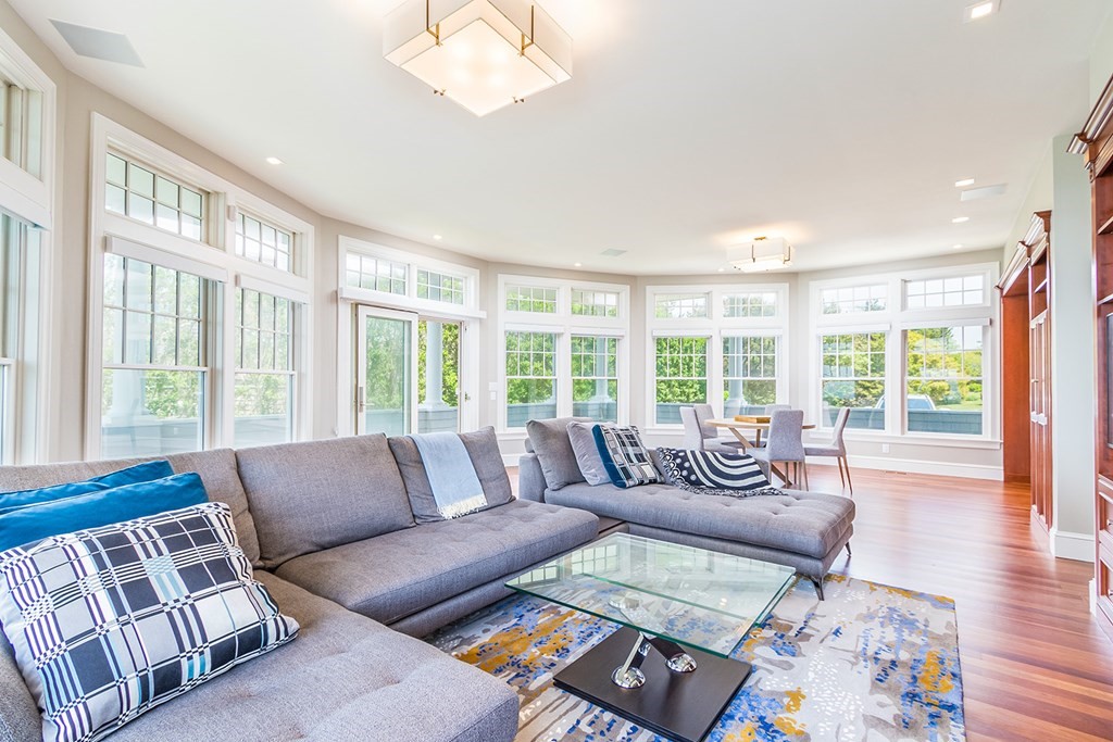 35 Sunset Point Road Falmouth, MA 02556 - Photo 11 of 27 a living room with furniture and a large window