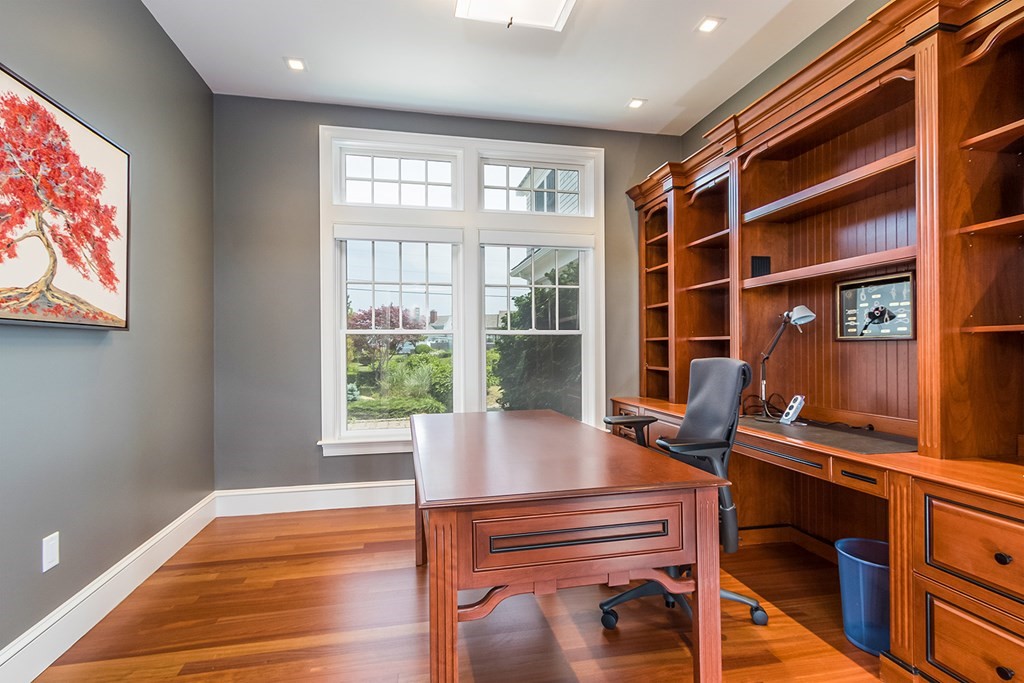35 Sunset Point Road Falmouth, MA 02556 - Photo 12 of 27 a room with wooden floor and windows