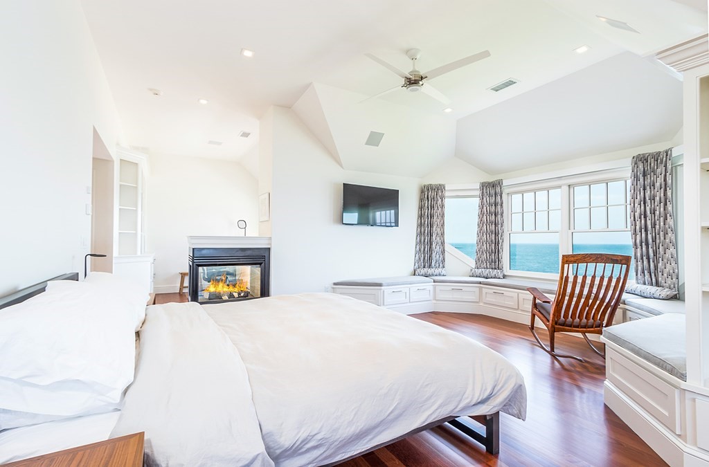 35 Sunset Point Road Falmouth, MA 02556 - Photo 13 of 27 a spacious bedroom with a bed a couch and dresser