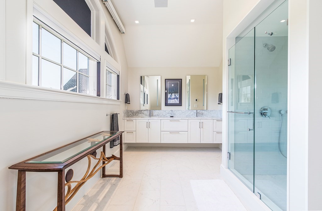 35 Sunset Point Road Falmouth, MA 02556 - Photo 15 of 27 a bathroom with a tub shower vanity and sink
