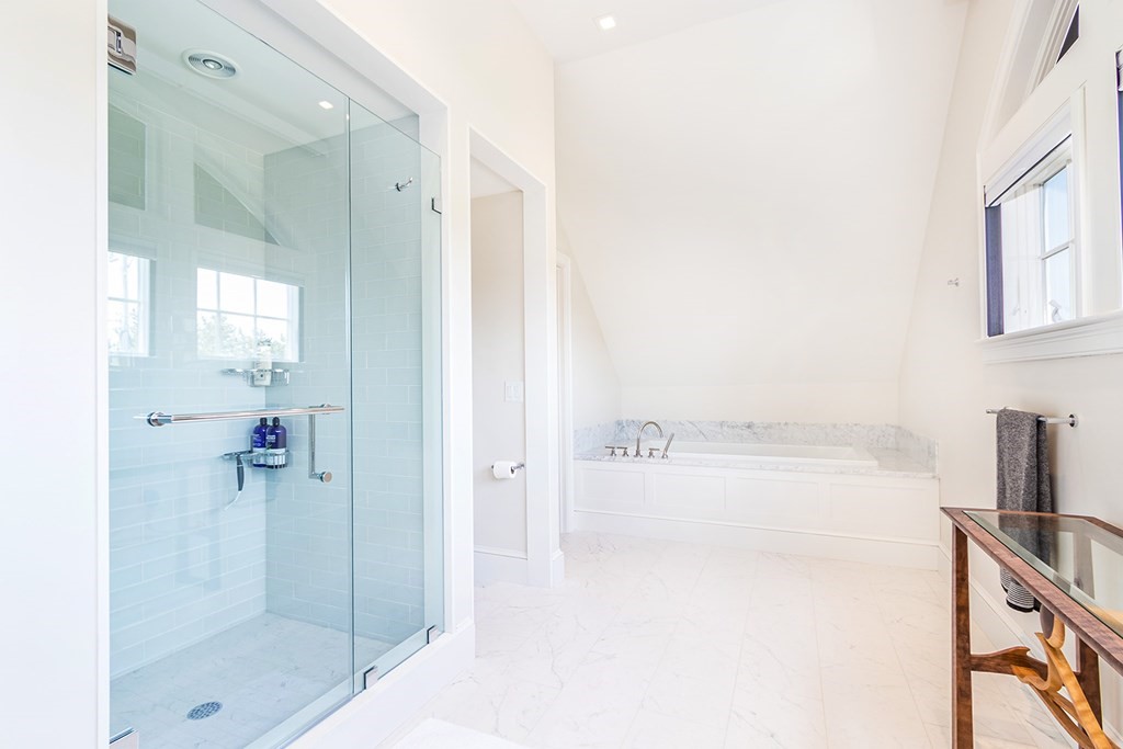 35 Sunset Point Road Falmouth, MA 02556 - Photo 16 of 27 a bathroom with a bathtub and a shower