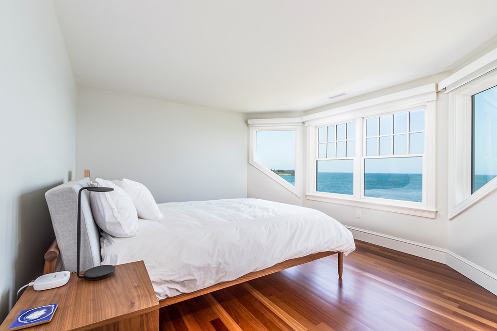 35 Sunset Point Road Falmouth, MA 02556 - Photo 18 of 27 a bedroom with a bed and a window