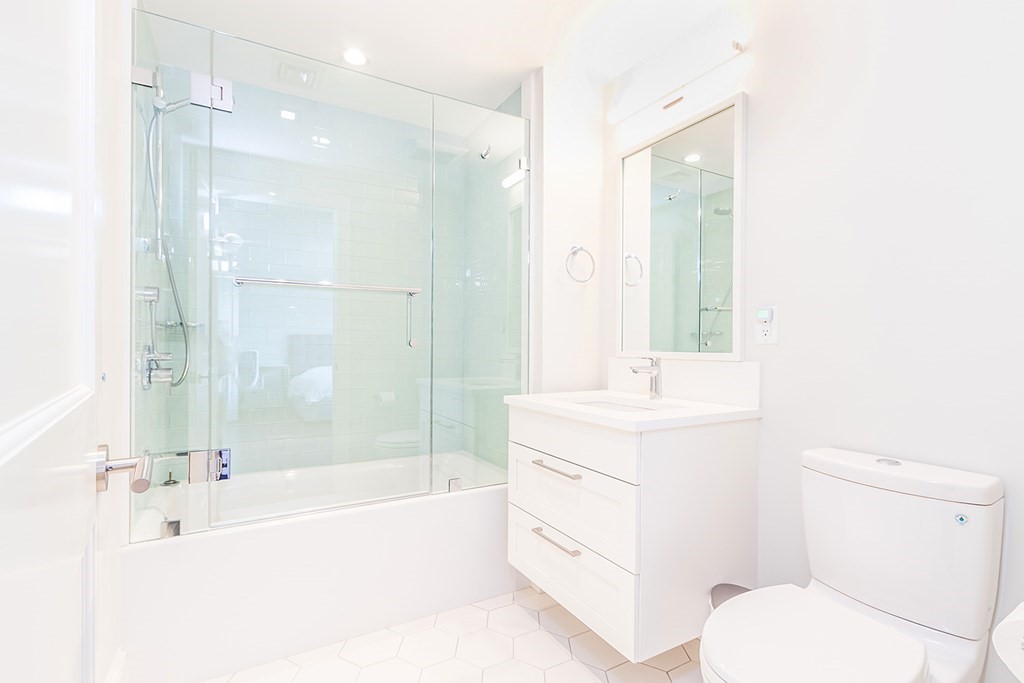 35 Sunset Point Road Falmouth, MA 02556 - Photo 19 of 27 a bathroom with a sink a toilet and shower