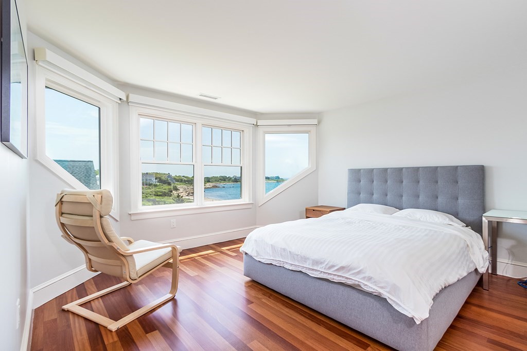 35 Sunset Point Road Falmouth, MA 02556 - Photo 20 of 27 a bedroom with a bed and a window