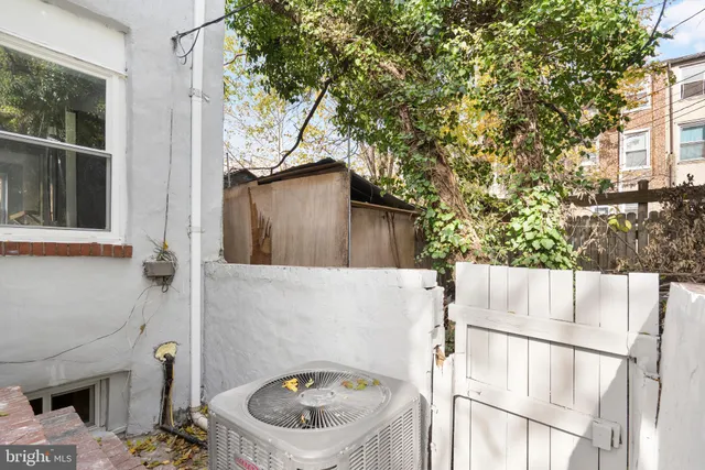 a view of street with parked cars