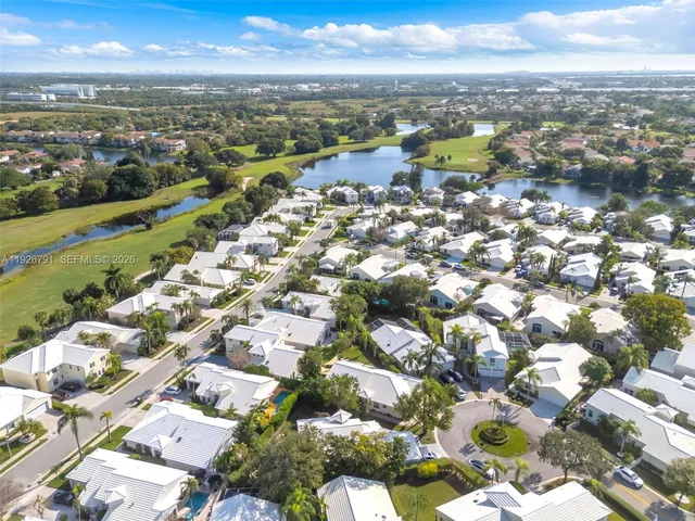 an aerial view of a city with lots of residential buildings