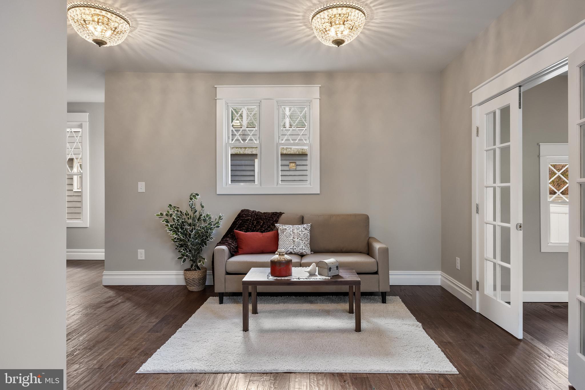 52 Madison Avenue Mount Holly, NJ 08060 - Photo 12 of 53 a living room with furniture and wooden floor