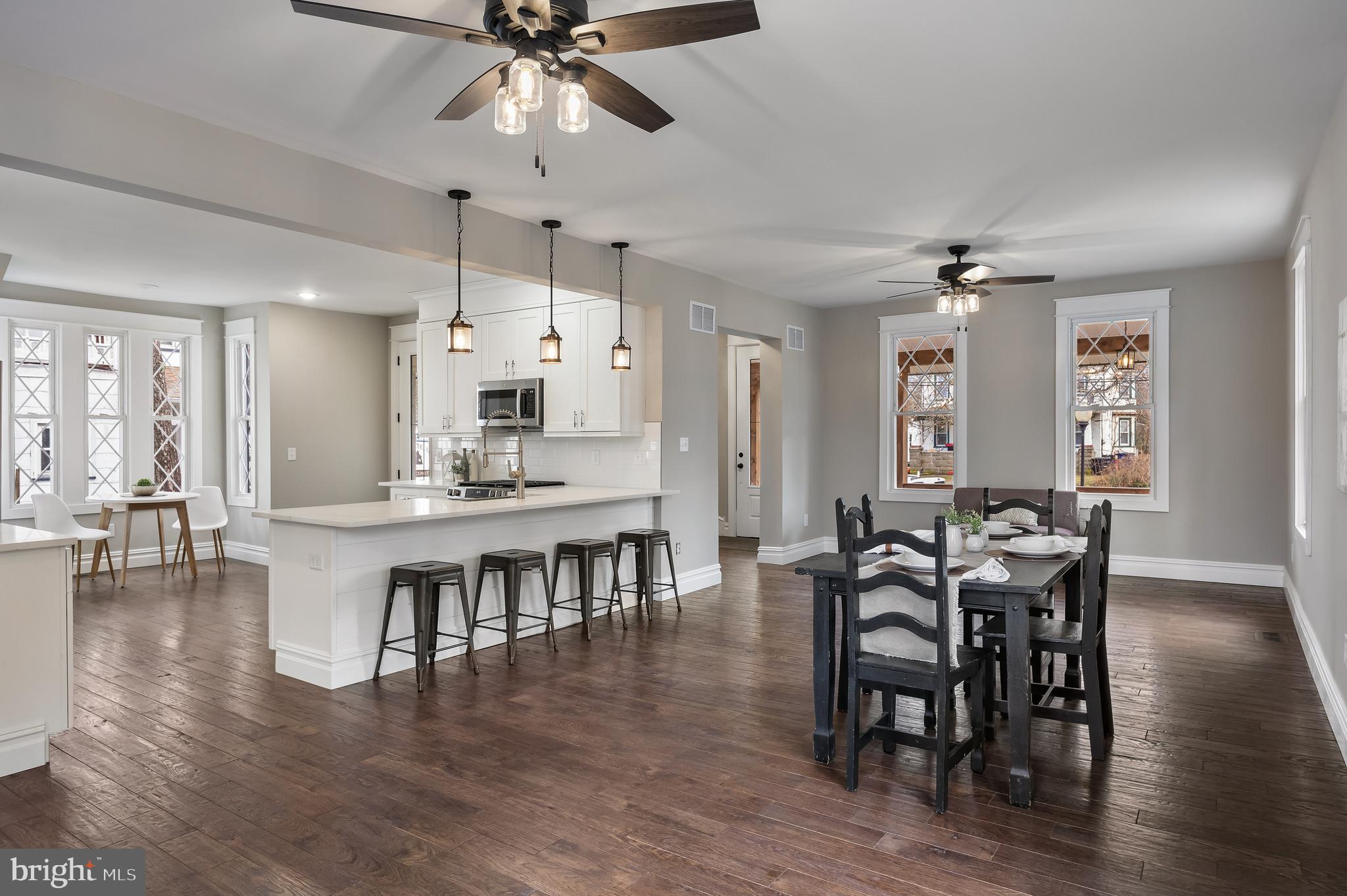 52 Madison Avenue Mount Holly, NJ 08060 - Photo 15 of 53 a view of a a dining room with furniture window and wooden floor