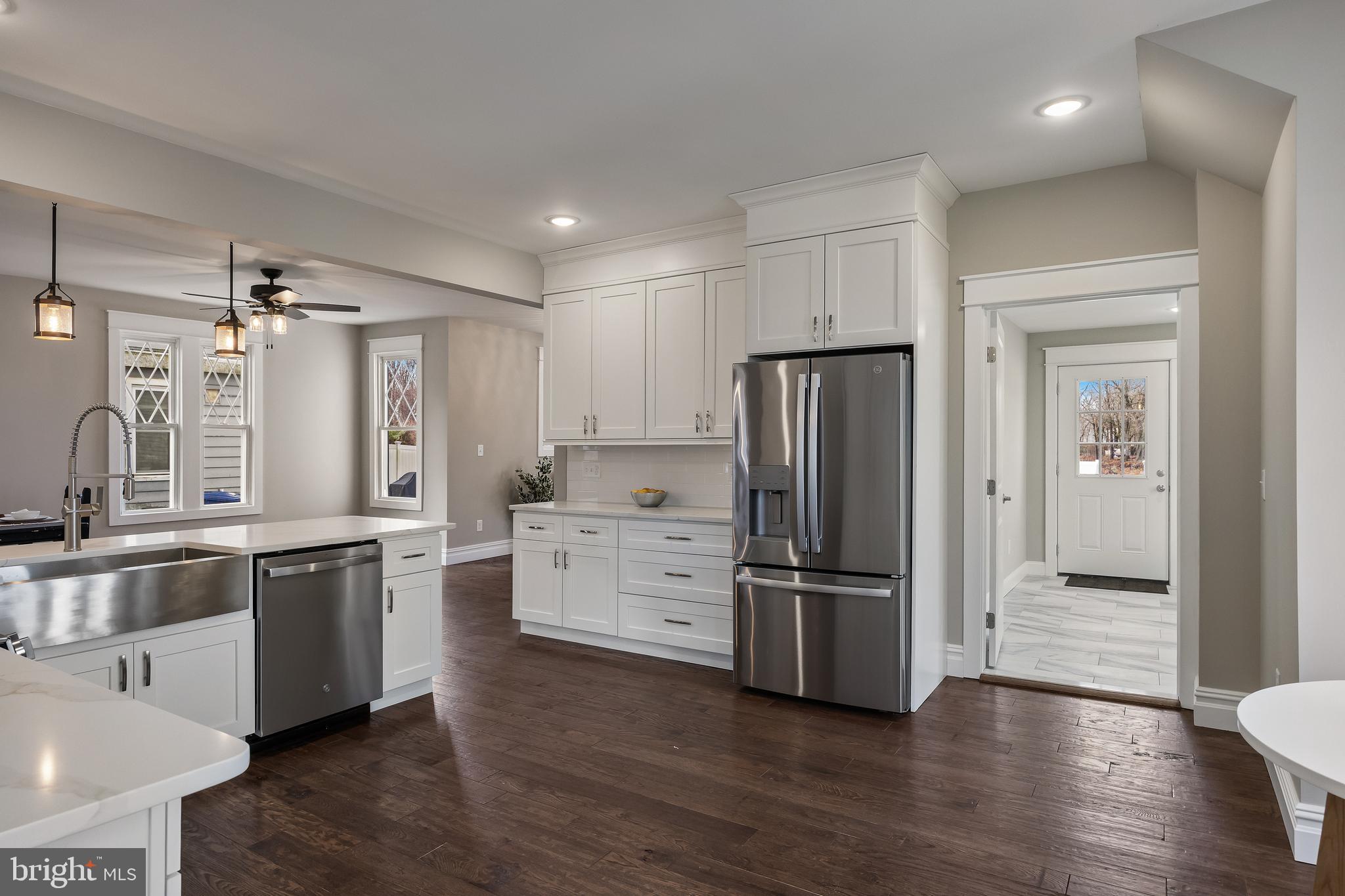 52 Madison Avenue Mount Holly, NJ 08060 - Photo 20 of 53 a kitchen with stainless steel appliances a refrigerator sink and cabinets