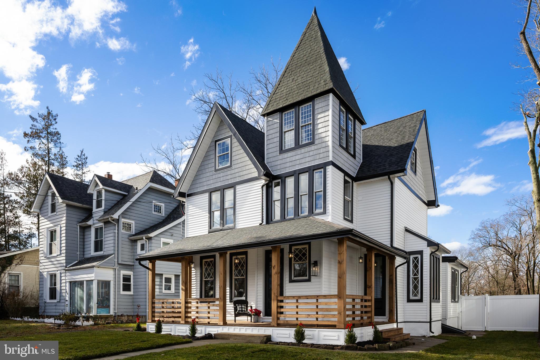 52 Madison Avenue Mount Holly, NJ 08060 - Photo 2 of 53 a front view of a residential apartment building with a yard