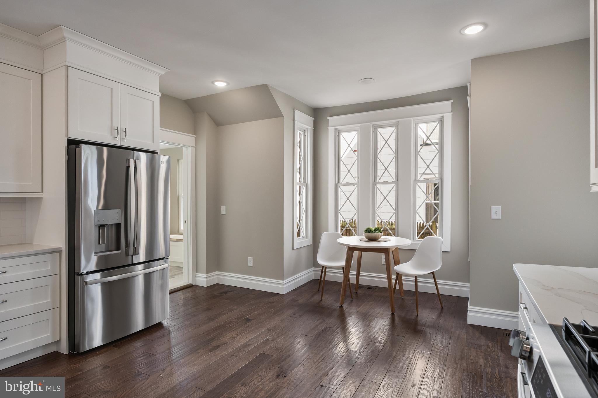 52 Madison Avenue Mount Holly, NJ 08060 - Photo 21 of 53 a living room with furniture and large windows