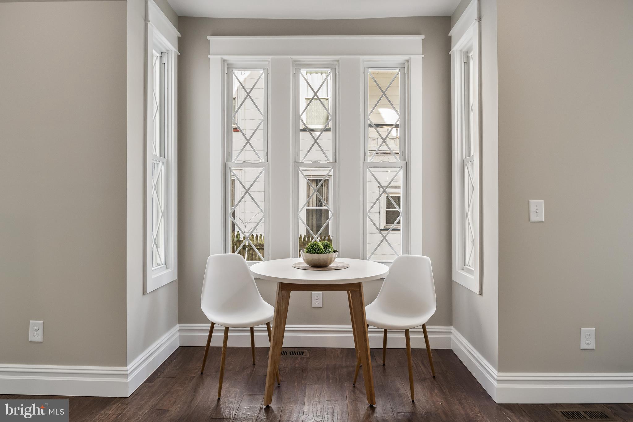 52 Madison Avenue Mount Holly, NJ 08060 - Photo 22 of 53 a view of a dining room with furniture and wooden floor