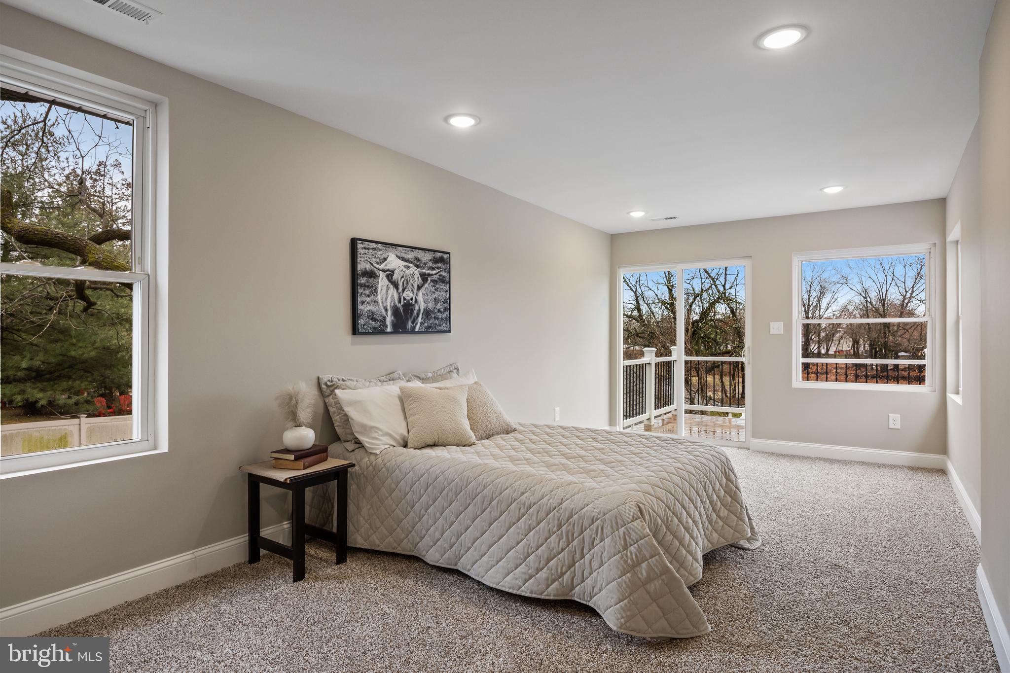 52 Madison Avenue Mount Holly, NJ 08060 - Photo 24 of 53 a spacious bedroom with a bed and a large window