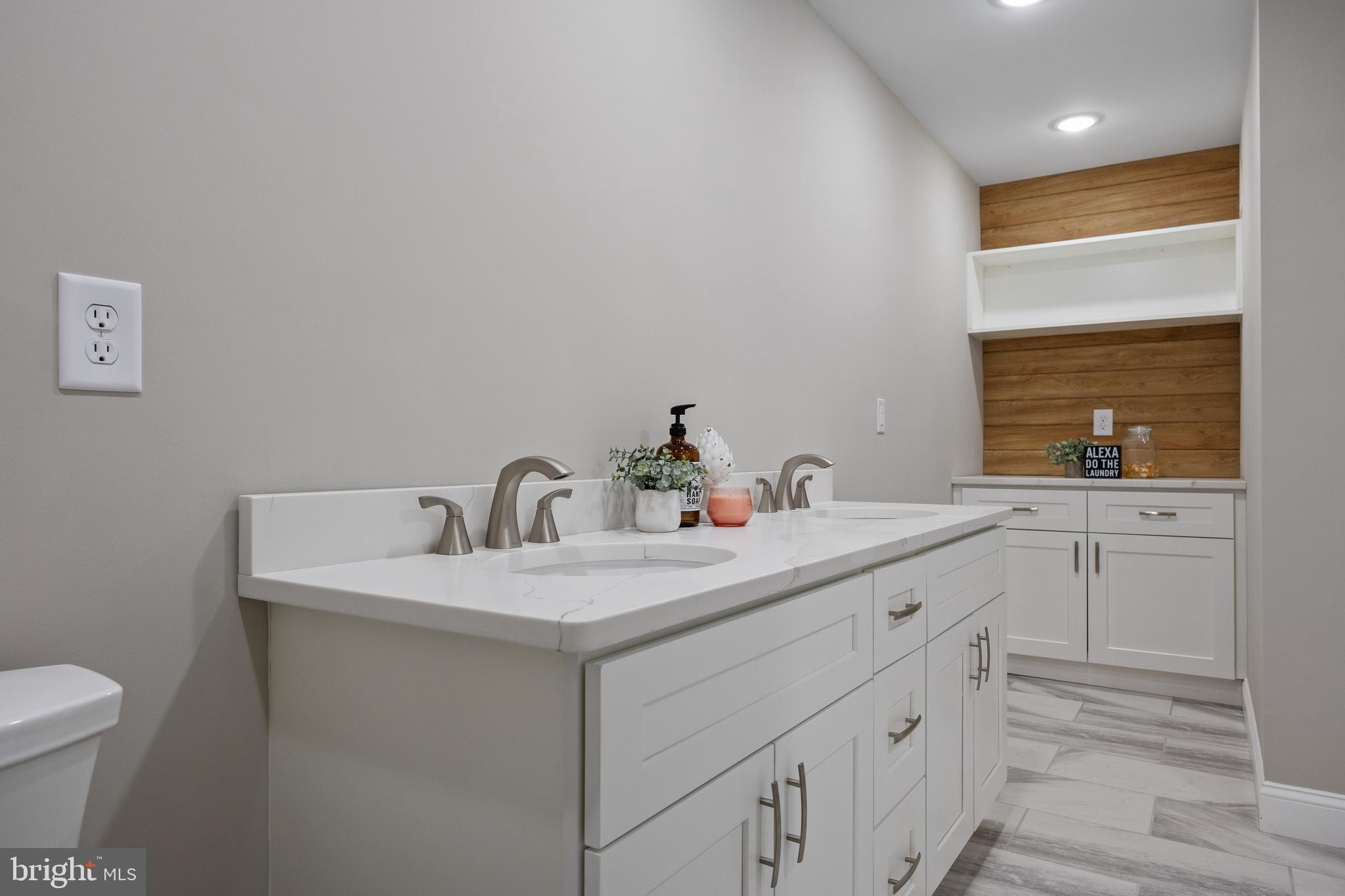 52 Madison Avenue Mount Holly, NJ 08060 - Photo 30 of 53 a bathroom with a sink and a toilet