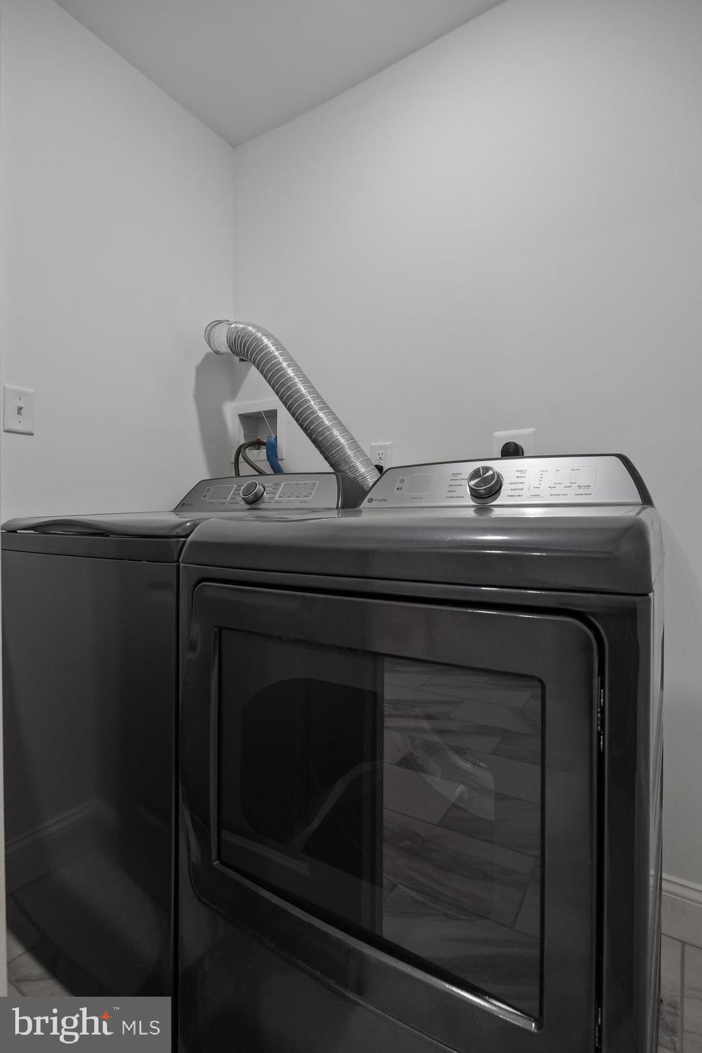 52 Madison Avenue Mount Holly, NJ 08060 - Photo 33 of 53 a utility room with dryer and washer