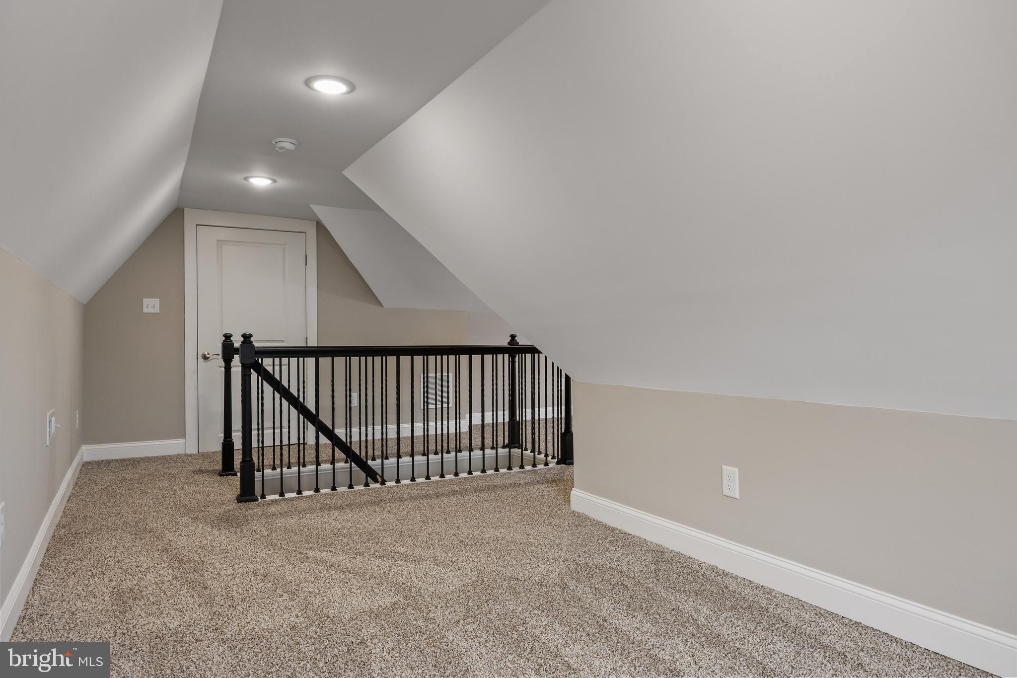 52 Madison Avenue Mount Holly, NJ 08060 - Photo 35 of 53 a view of staircase with lots of frames on wall and stairs