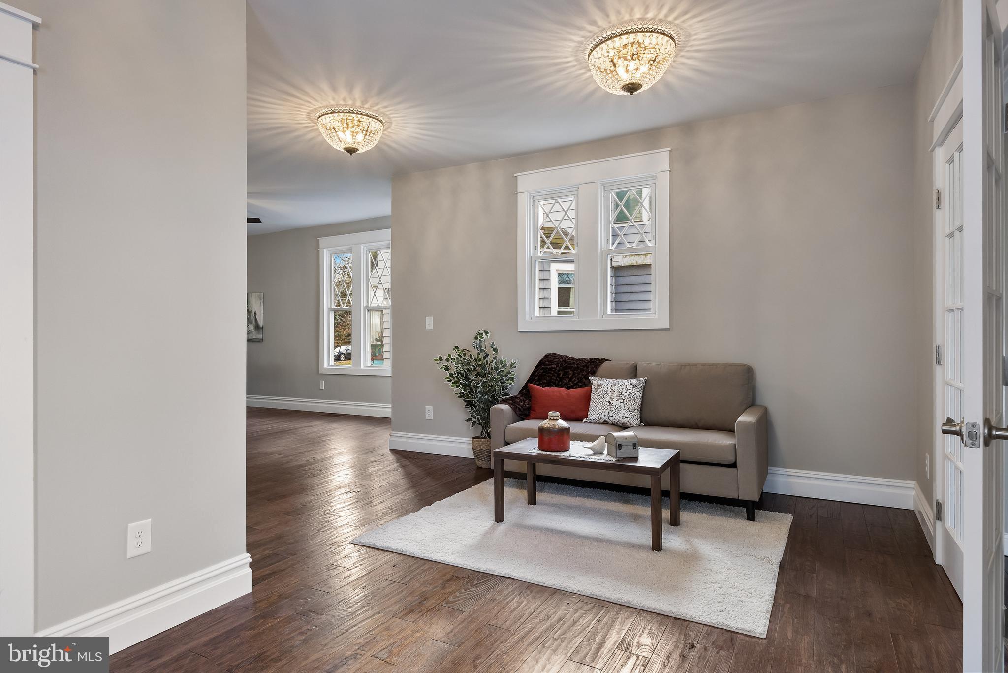52 Madison Avenue Mount Holly, NJ 08060 - Photo 9 of 53 a living room with furniture and a window