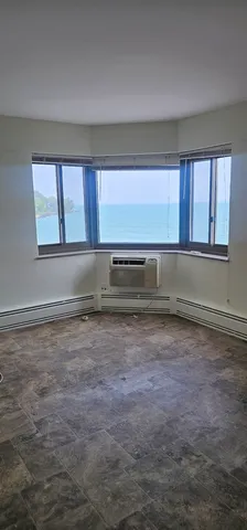 a bathroom with a sink a mirror and shower