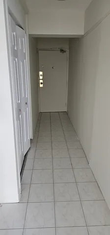 an empty room with an entryway