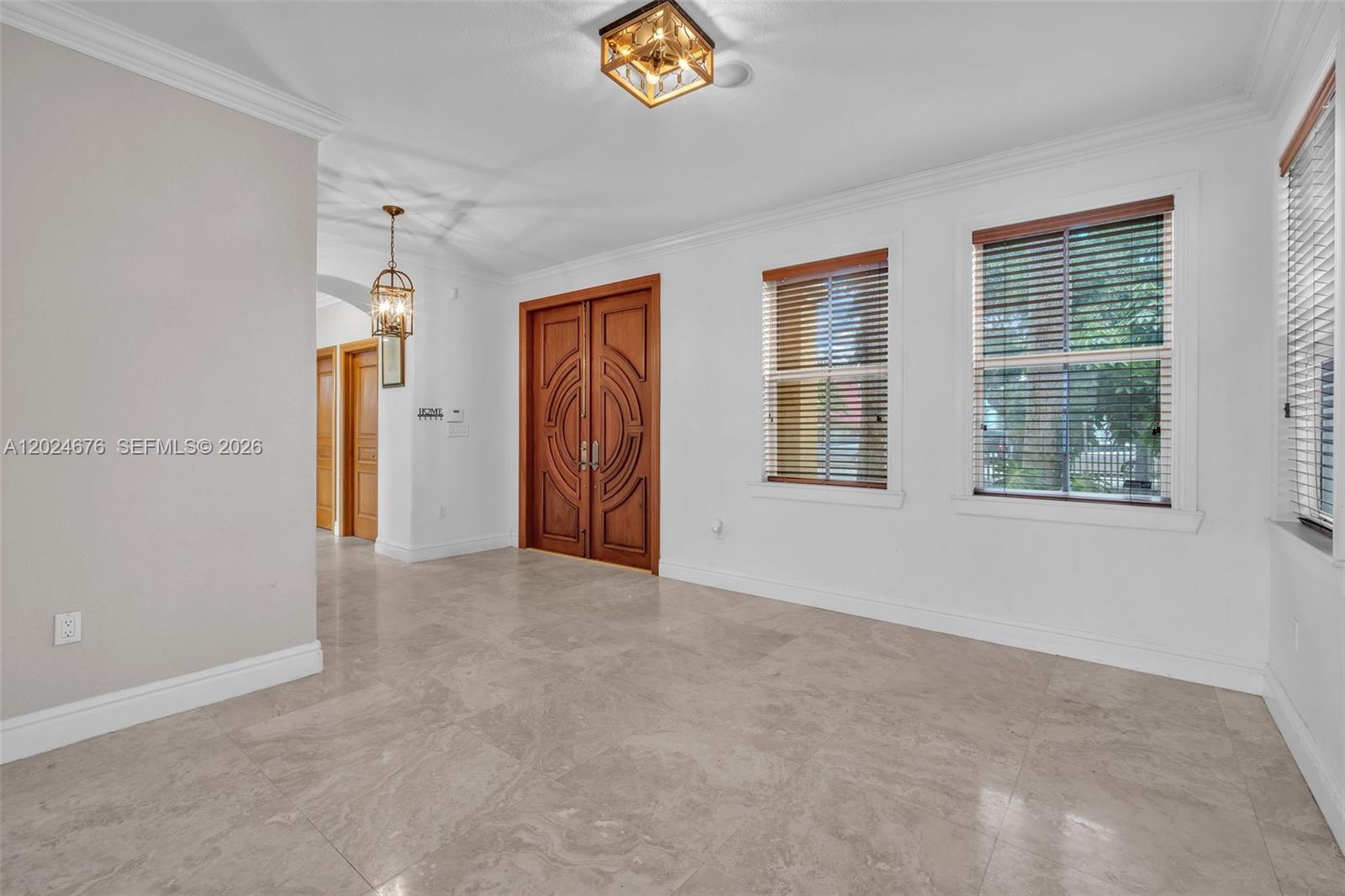 2155 Southwest 156th Court Miami, FL 33185 - Photo 15 of 57 a view of an empty room with a window