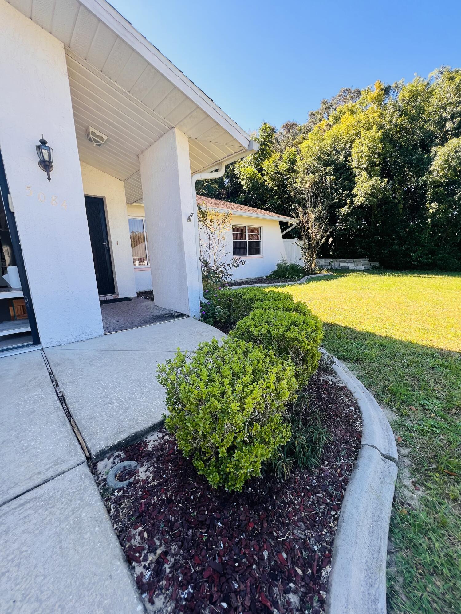 5084 Harbinger Road Spring Hill, FL 34608 - Photo 3 of 25 970720C3-A5A1-4AF4-89D6-F95D47B2F64D