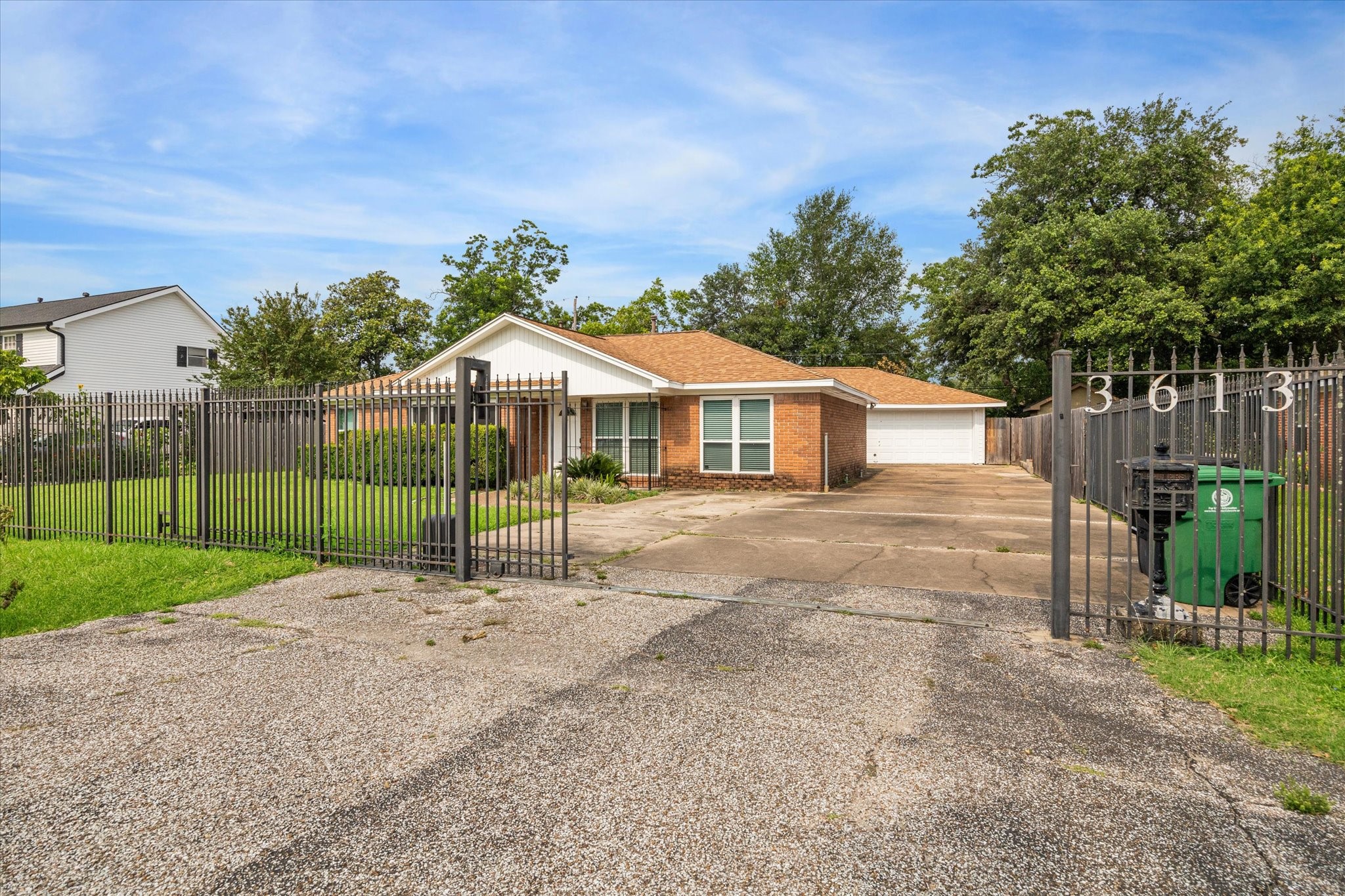3613 Lazy Spring Drive Houston, TX 77080 - Photo 21 of 22 a house with green field in front of it