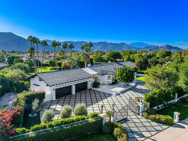 a view of a house with swimming pool