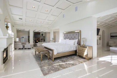 a living room with furniture fireplace and a flat screen tv