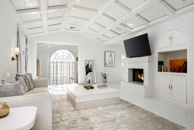 a bed room with a bed and a night stand