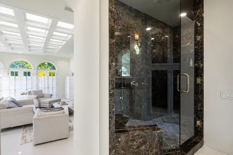 a view of a swimming pool with a yard