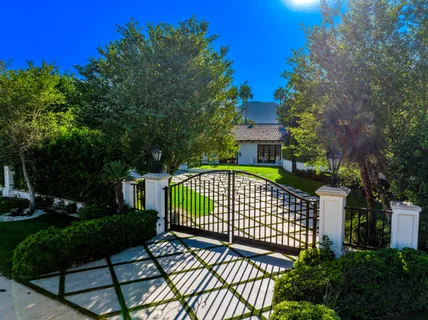a view of a livingroom with furniture and window