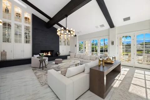 a kitchen with a stove and a shower